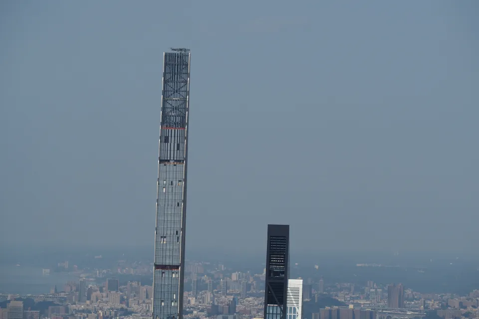 New York City, New York United States - August 29 2021: Steinway Tower 111 West 57th Street on Billionaires' Row Midtown Manhattan skyscrapers with summer clouds.